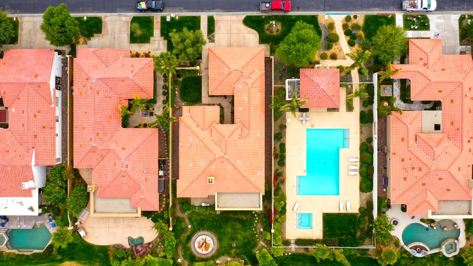 Aerial view of a desert subdivision with backyard pools